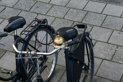 High angle view of bicycle parked on sidewalk