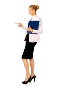 Woman standing against white background