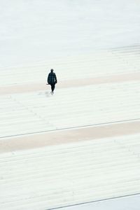 Man on beach against sky