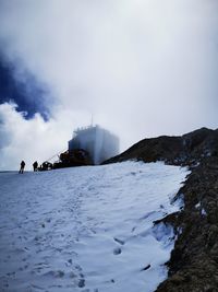 Scenic view of sea against sky during winter