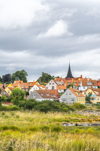 Svaneke town in coastal landscape, bornholm, denmark