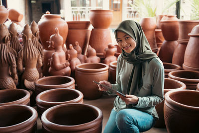 Portrait of woman working at workshop