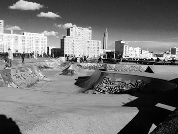 Panoramic view of beach and buildings against sky