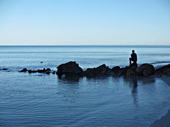 Scenic view of sea against clear sky