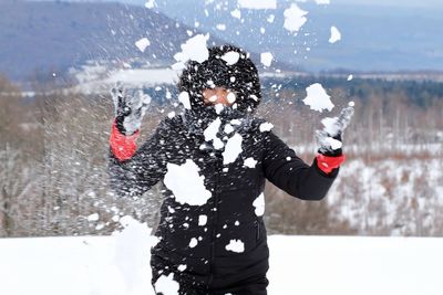 Man standing in snow