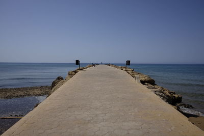 Scenic view of sea against clear sky