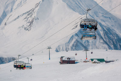 High angle view of ski lift on snowcapped mountain