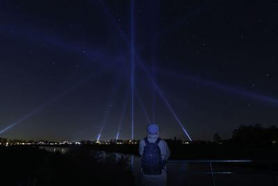 Light painting against blue sky at night