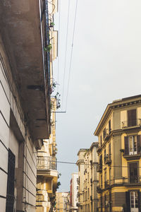 Low angle view of buildings against sky