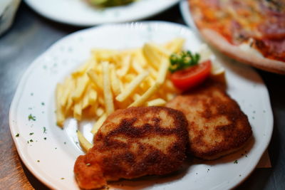 Close-up of food served on table