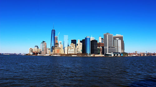 View of cityscape against clear sky