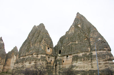 Low angle view of old ruins against clear sky