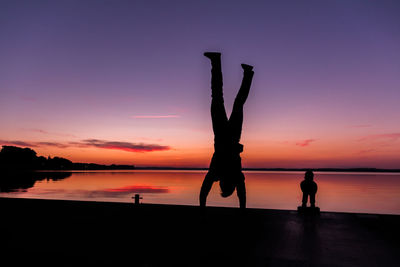 Silhouette of people at sunset