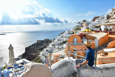 Panoramic view of buildings against sea