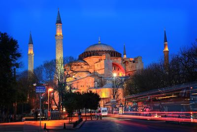 Road leading towards hagia sophia in city at dusk