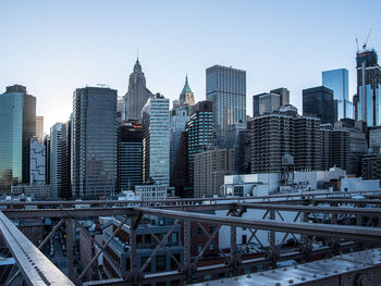 Modern cityscape against clear sky