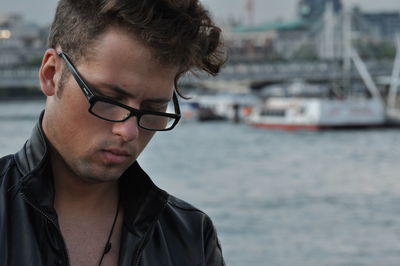 Close-up of young man wearing eyeglasses