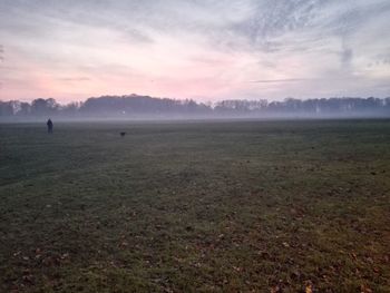 Scenic view of landscape against sky during sunset