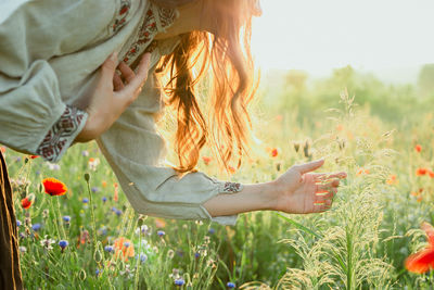 Close up lady touches grass concept photo