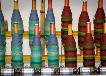 Wool yarn threads, colored yarn spools, ancient method of processing, knitting as a hobby