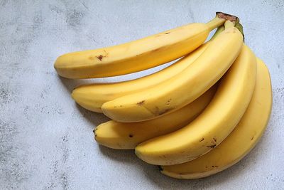High angle view of yellow fruit on table against wall