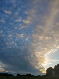 Low angle view of dramatic sky during sunset