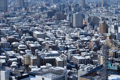 High angle view of modern buildings in city