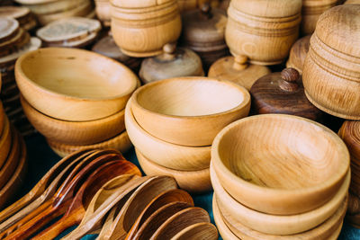 Handmade wooden tableware on the counter. eco-friendly spoons and plates