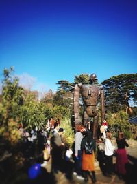 Statue against clear blue sky