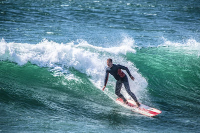 Man surfing in sea