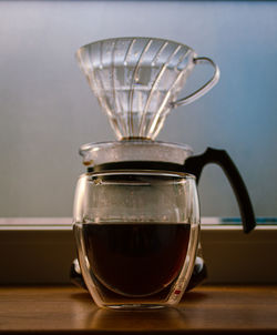 Close-up of coffee cup on table