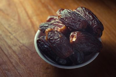 High angle view of fruit in plate on table