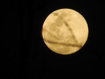 Low angle view of moon against sky at night