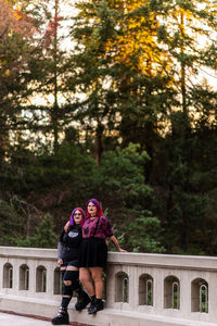 Young women with arms around each other