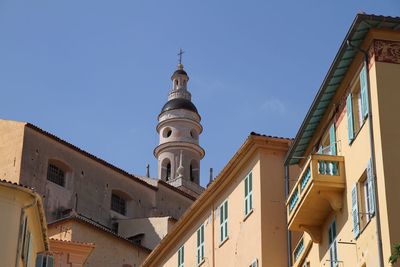 Low angle view of temple against clear blue sky