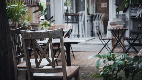 Empty chairs and table in cafe