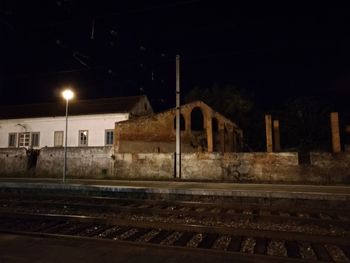 View of railroad tracks at night