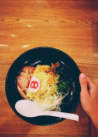 Directly above shot of person preparing food in plate