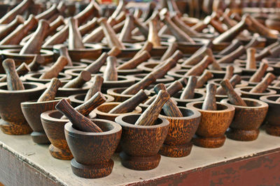 Wooden mortar and pestles for sale at market