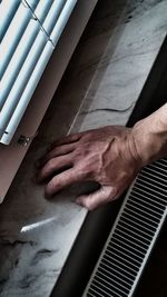 Close-up of hands working on table