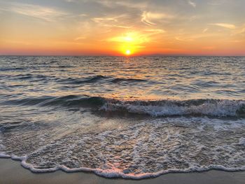 Scenic view of sea against sky during sunset