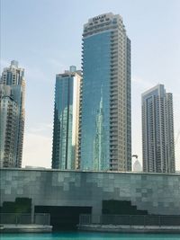 Low angle view of modern buildings against clear sky