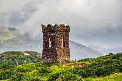 Old ruin building against sky