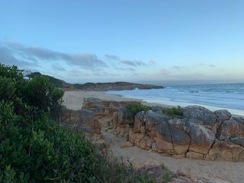 Scenic view of beach against sky