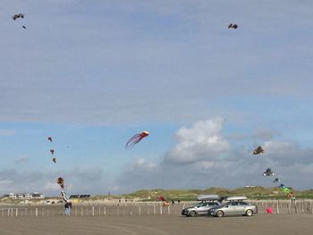 Parachute flying in sky