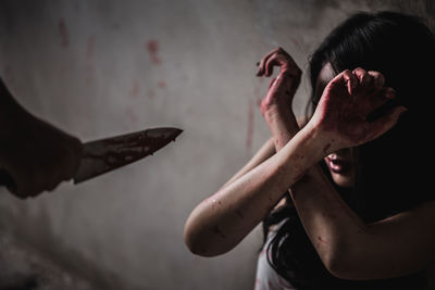 Portrait of woman with hands