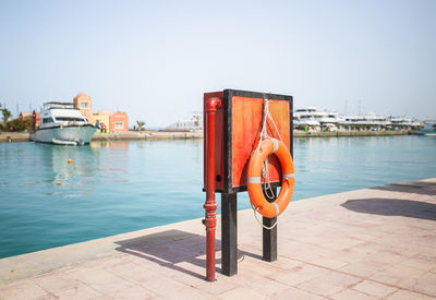 Life belt hanging at beach