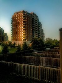 Low angle view of buildings against sky in city