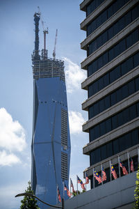 Low angle view of buildings against sky in city