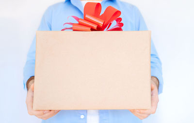 Close-up of gift box against white background